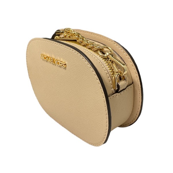 Hi! Selling the Micheal Kors Mini Jet Lag purse in beige! Has never been worn! - Picture 2 of 3